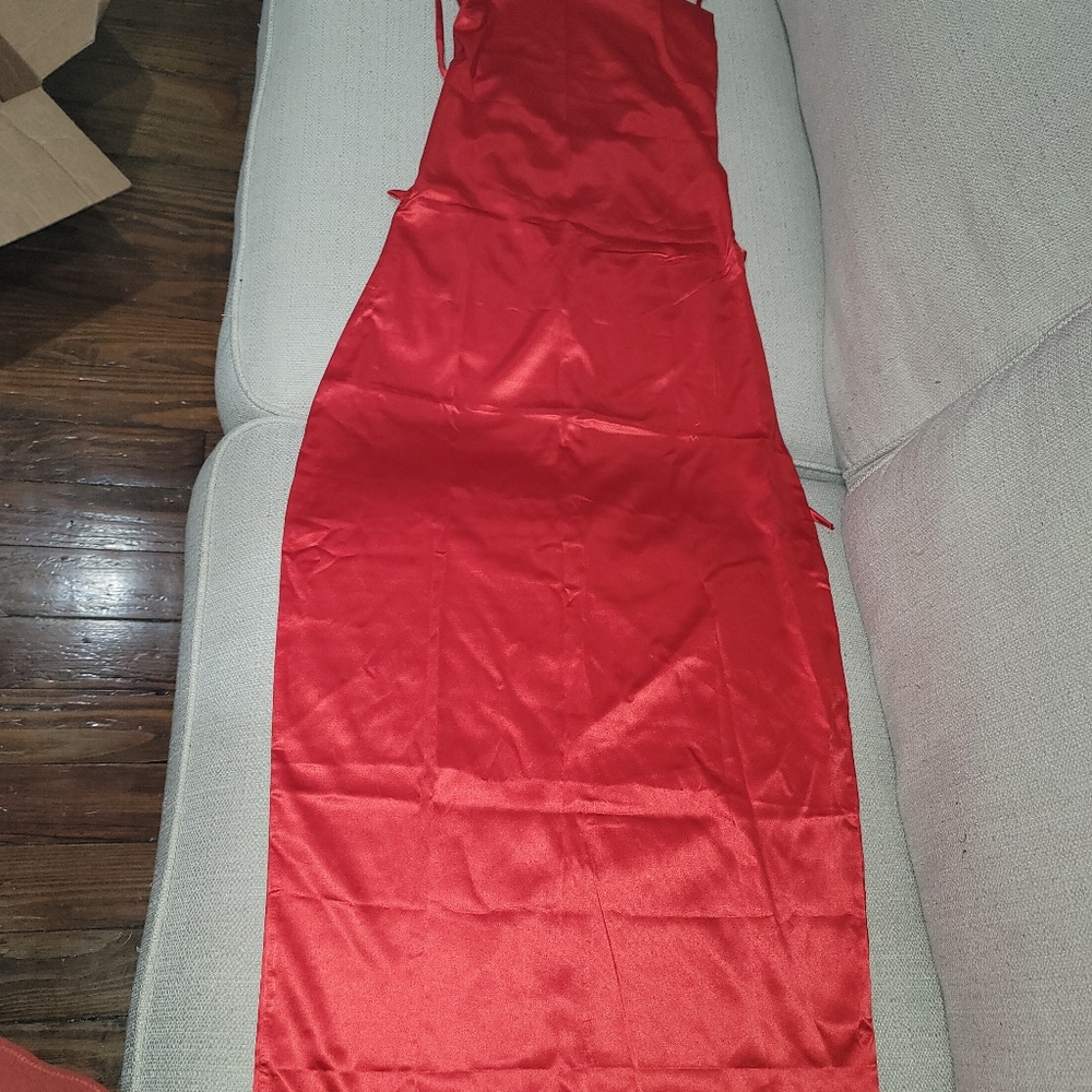 Silk form fitting date night dress.Backless/Straps